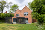 upvc window and door installation brick house with large garden